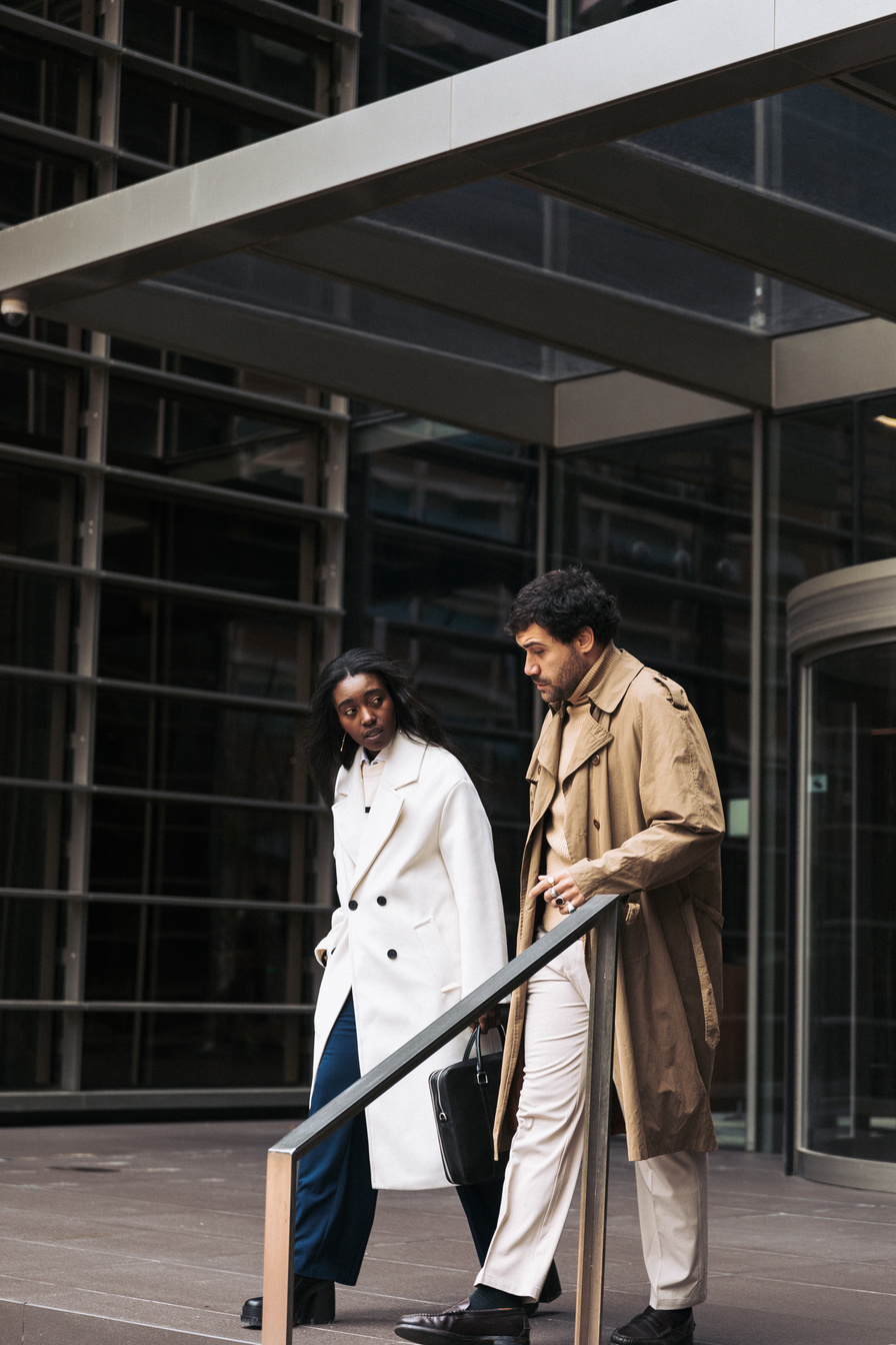 Male and Female Business Partners on a Trip Outdoors
